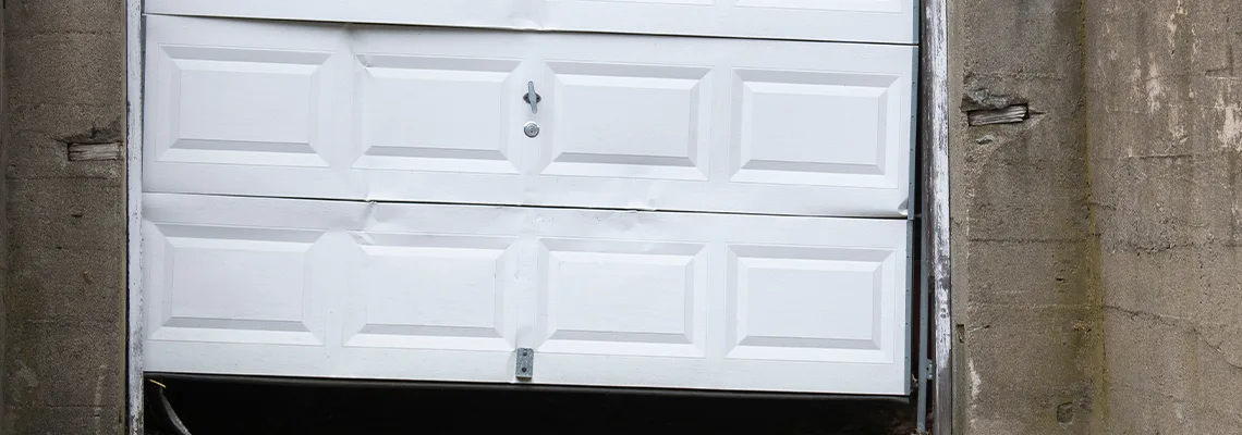 Garage Door Got Hit By A Car Dent Removal in Lehigh Acres, FL